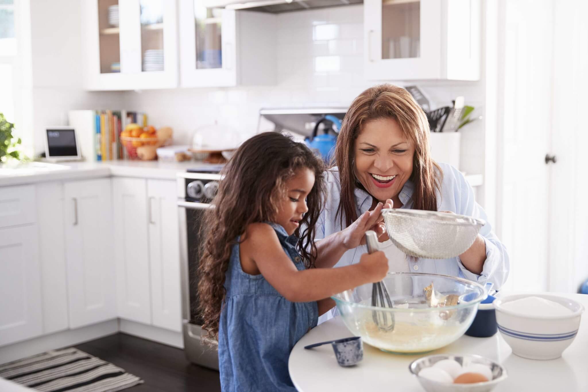 mother and daughter baking together